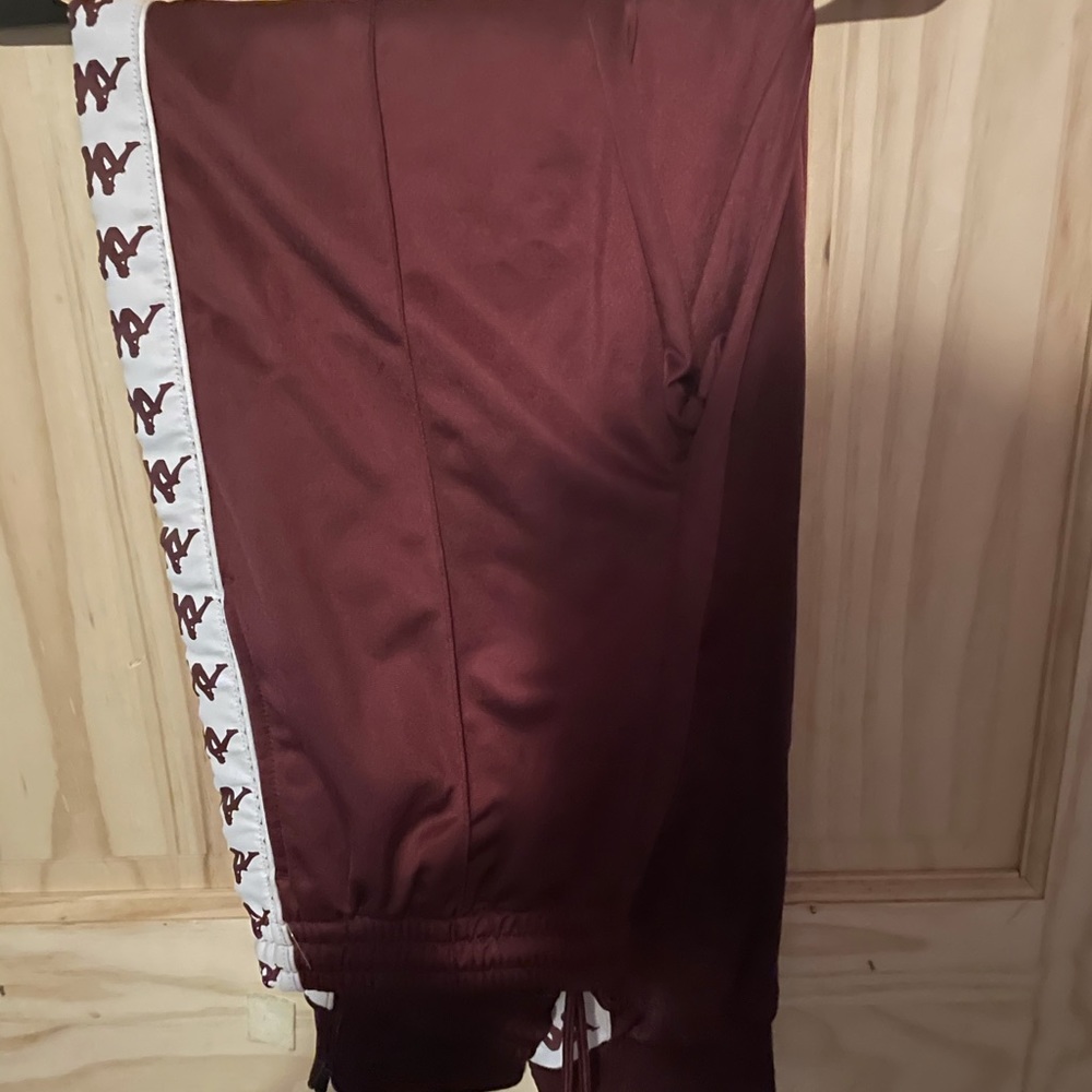 Men’s Kappa joggers. Burgundy in color. Size Small